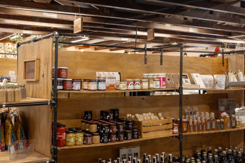 Artisan goods at CC's Market including tallow skincare, herbal remedies, and baked goods